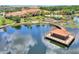 Aerial view of lakefront community with gazebo at 341 Navarra Ln, Davenport, FL 33837