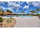 Community pool area with lounge chairs at 341 Navarra Ln, Davenport, FL 33837