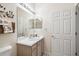Clean bathroom with light wood vanity and updated fixtures at 123 Gulf Dr, Kissimmee, FL 34759