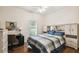 Guest bedroom with built-in shelving and window at 123 Gulf Dr, Kissimmee, FL 34759