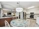 Bright kitchen with stainless steel appliances and white cabinets at 123 Gulf Dr, Kissimmee, FL 34759