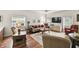Bright living room featuring hardwood floors and ample natural light at 123 Gulf Dr, Kissimmee, FL 34759