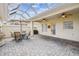 Covered patio with pavers, seating area, and fountain at 123 Gulf Dr, Kissimmee, FL 34759