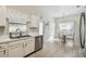 Bright kitchen with stainless steel appliances and breakfast nook at 123 Gulf Dr, Kissimmee, FL 34759