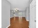 Spacious living area with hardwood floors and neutral walls at 26 Cedar Dr, Davenport, FL 33837