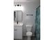 Updated bathroom with white vanity and modern fixtures at 411 Gannet Ct, Kissimmee, FL 34759