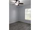 Spacious bedroom featuring wood-look floors and a ceiling fan at 411 Gannet Ct, Kissimmee, FL 34759