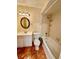 Clean bathroom with a tub shower combo at 5275 Images Cir # 104, Kissimmee, FL 34746