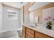 Bathroom with a tub, toilet and vanity at 121 Madiera Beach Blvd, Kissimmee, FL 34746