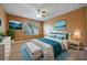 Bright bedroom with large bed and window at 121 Madiera Beach Blvd, Kissimmee, FL 34746