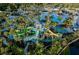 Large resort pool area with slides and water features at 14501 Grove Resort Ave # 3439, Winter Garden, FL 34787