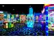 Brightly lit arcade with many games at 14501 Grove Resort Ave # 3439, Winter Garden, FL 34787