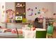 Bright arts and crafts room, well-equipped with tables, chairs, and supplies at 14501 Grove Resort Ave # 3439, Winter Garden, FL 34787