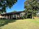 Brick ranch house with mature landscaping at 2867 Longleaf Ct, Kissimmee, FL 34746