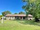 Brick ranch house with a large yard at 2867 Longleaf Ct, Kissimmee, FL 34746