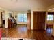 Bright music room with hardwood floors and a beautiful piano at 2867 Longleaf Ct, Kissimmee, FL 34746