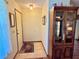 Inviting entryway with tile flooring and a charming display cabinet at 2867 Longleaf Ct, Kissimmee, FL 34746