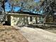 Cozy single-story home with a garage and driveway at 1940 Tripaul Ct, Bartow, FL 33830