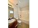 Clean bathroom with tub, toilet, and vanity at 1940 Tripaul Ct, Bartow, FL 33830