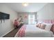 Spacious bedroom featuring a large bed and a TV at 872 Sydney St, Davenport, FL 33837