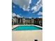 Community pool with surrounding apartments at 4768 Walden Cir # 327, Orlando, FL 32811