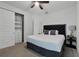 Spacious bedroom with king-size bed and built-in shelving at 451 Lasso Dr, Kissimmee, FL 34747