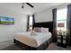 Bedroom with king-size bed and ensuite bathroom at 451 Lasso Dr, Kissimmee, FL 34747