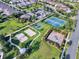 Community tennis, basketball and volleyball courts at 451 Lasso Dr, Kissimmee, FL 34747