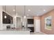 Modern kitchen featuring granite countertops and stainless steel appliances at 4523 Cypress Cay Way, Kissimmee, FL 34746