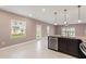 Open concept kitchen with island and stainless steel appliances at 4523 Cypress Cay Way, Kissimmee, FL 34746