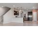 Modern kitchen with island and stainless steel appliances at 4523 Cypress Cay Way, Kissimmee, FL 34746
