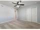 Bright bedroom with ceiling fan and carpet flooring at 4523 Cypress Cay Way, Kissimmee, FL 34746