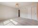 Light and airy bedroom with double doors and closet at 4523 Cypress Cay Way, Kissimmee, FL 34746