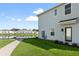 Private entrance with modern door and landscaping at 4523 Cypress Cay Way, Kissimmee, FL 34746