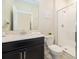 Clean bathroom with single vanity, toilet, and shower stall at 1157 Challenge Dr # 1157, Davenport, FL 33896
