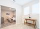 Secondary bedroom with two twin beds and access to a hallway at 1157 Challenge Dr # 1157, Davenport, FL 33896