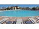 Large community pool with plenty of lounge chairs at 1157 Challenge Dr # 1157, Davenport, FL 33896