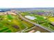 Community overview showcasing homes, golf course, and landscaping at 1157 Challenge Dr # 1157, Davenport, FL 33896