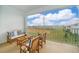 Relaxing screened balcony with outdoor furniture and a view at 1157 Challenge Dr # 1157, Davenport, FL 33896