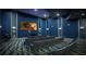 Community theater room with comfortable seating at 1157 Challenge Dr # 1157, Davenport, FL 33896