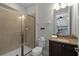 Bathroom with shower, toilet and granite vanity at 7617 Brookhurst Ln, Kissimmee, FL 34747