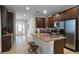 Modern kitchen with stainless steel appliances and granite countertops at 7617 Brookhurst Ln, Kissimmee, FL 34747