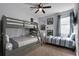 Bedroom with bunk beds and superhero decor at 7617 Brookhurst Ln, Kissimmee, FL 34747