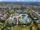 Aerial view of community with large pool and waterpark at 7617 Brookhurst Ln, Kissimmee, FL 34747