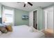 King bedroom with TV and walk-in closet at 7617 Brookhurst Ln, Kissimmee, FL 34747