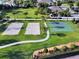 Aerial view of community amenities including a basketball court and volleyball courts at 7617 Brookhurst Ln, Kissimmee, FL 34747
