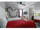 Bedroom with twin beds, Mickey Mouse decor, and TV at 7617 Brookhurst Ln, Kissimmee, FL 34747