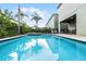 Inviting private pool with patio furniture at 7617 Brookhurst Ln, Kissimmee, FL 34747