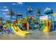 Community waterpark with slides, a play area, and a beach entry at 7617 Brookhurst Ln, Kissimmee, FL 34747
