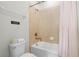 Clean bathroom with shower/tub combo and updated fixtures at 7617 Brookhurst Ln, Kissimmee, FL 34747
